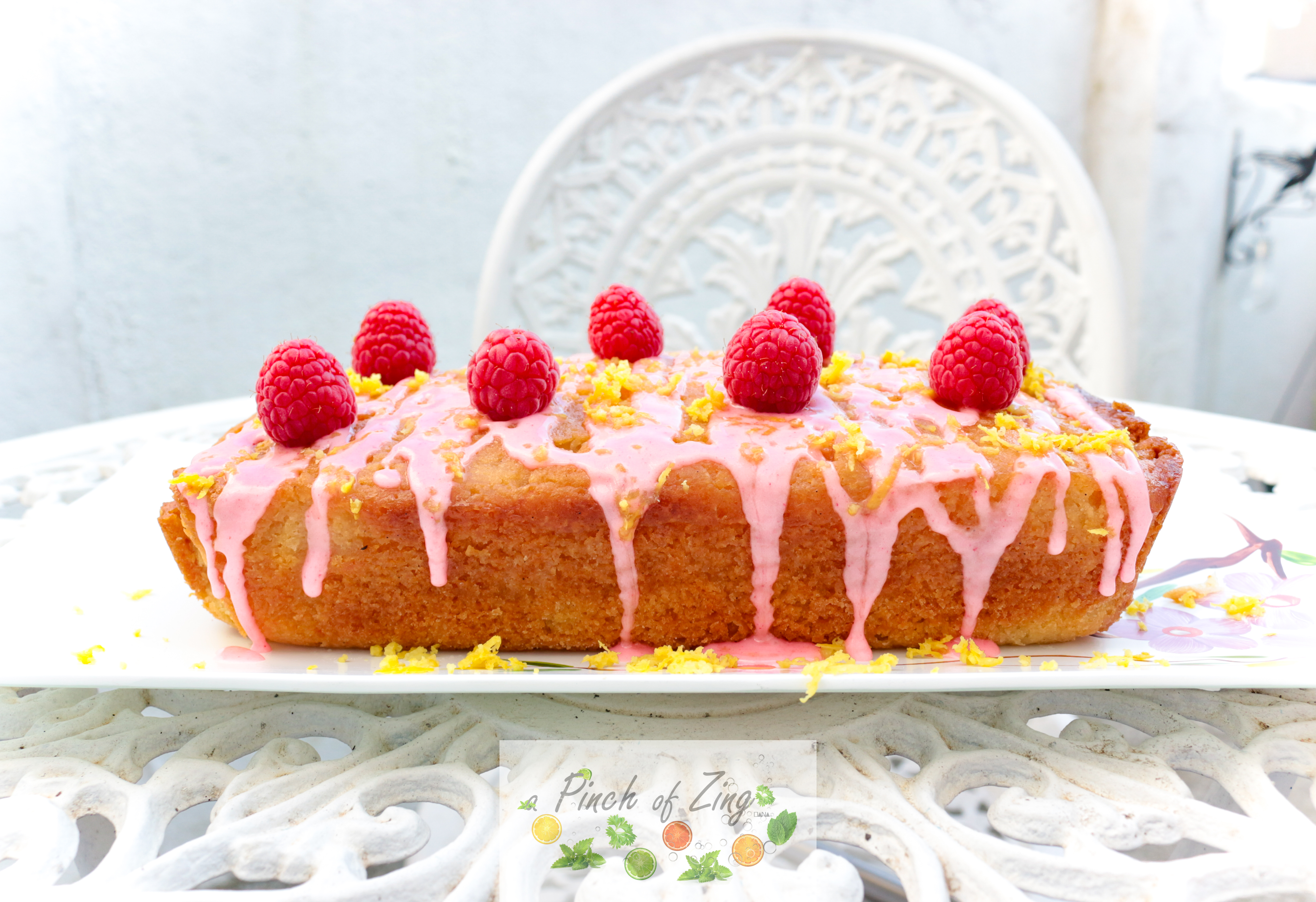Vegan lemon drizzle cake with raspberries